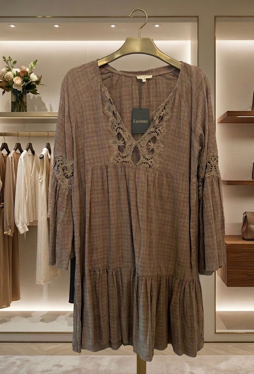 Mocha plaid cotton tiered mini dress with deep V crochet lace neckline and bell sleeves, on hanger  