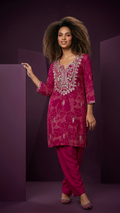 Magenta mirror-work kurta and farshi salwar co-ord, studio setting