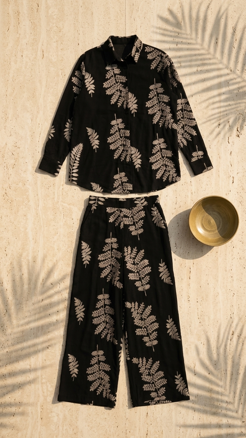 Black co-ord set with golden leaf embroidery, linen+rayon blend.